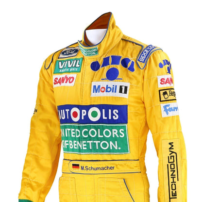 Close-up of the embroidered logos, stitching details, and breathable fabric textures from Michael Schumacher’s 1992 Benetton F1 race suit.