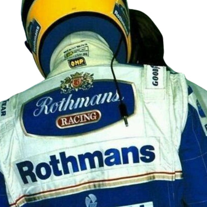 Back view of Ayrton Senna’s 1994 racing suit, showcasing bold sponsor patches and the striking color design, a tribute to his dedication to racing.