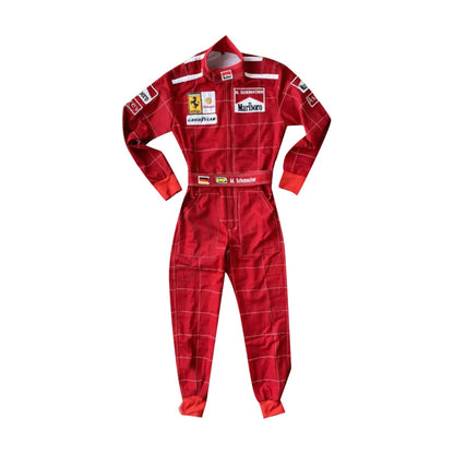 Front view of Michael Schumacher’s 1996 F1 race suit, featuring a striking red design with white accents and sponsor logos from his early years