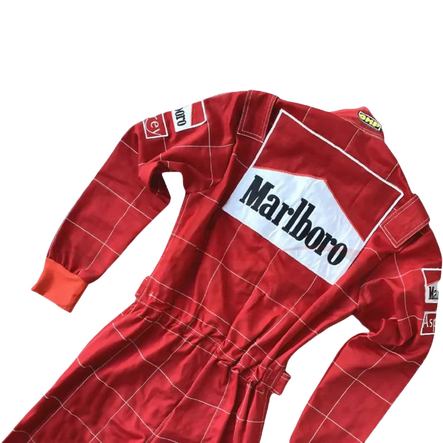 Backside of Schumacher’s 1996 race suit, showcasing Ferrari red and white design with classic sponsor patches, marking his first season