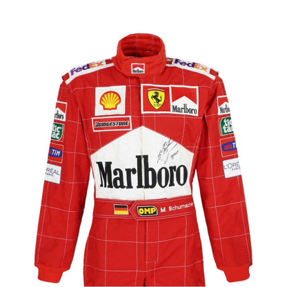 Close-up of Schumacher’s 2004 F1 suit, showing high-quality red fabric, tight white stitching, and finely printed sponsor details true to the original.