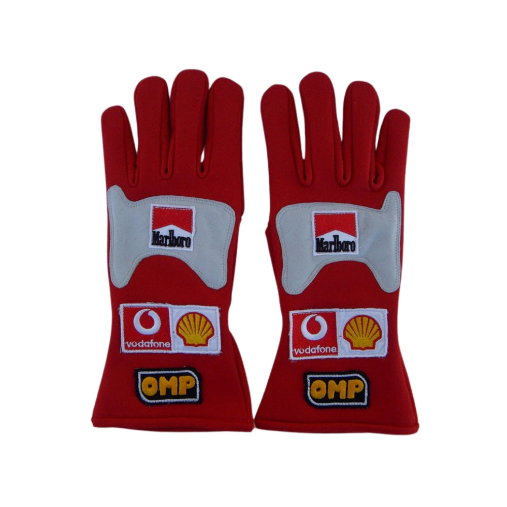 Red Michael Schumacher 2006 F1 Racing gloves with multiple brand logos on a white background