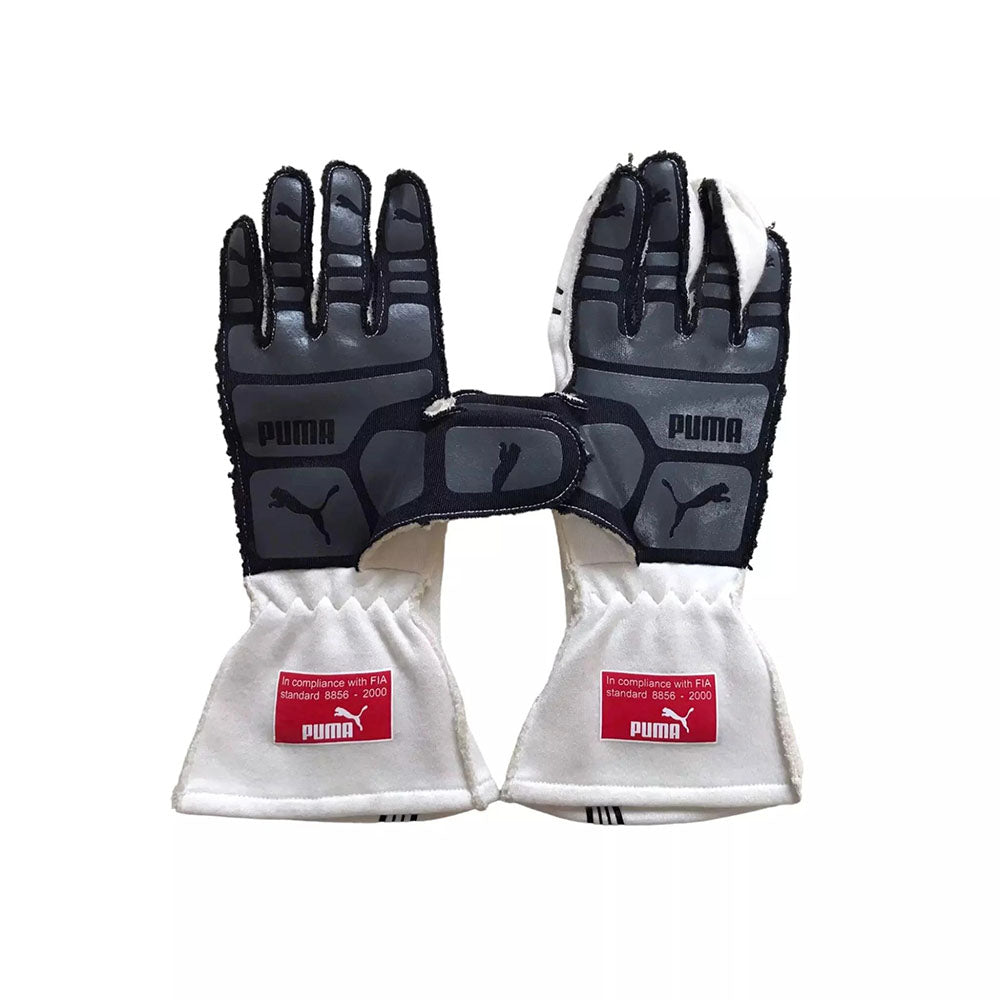 Pair of Puma Fernando Alonso 2009 F1 Racing gloves with black and white design on a white background