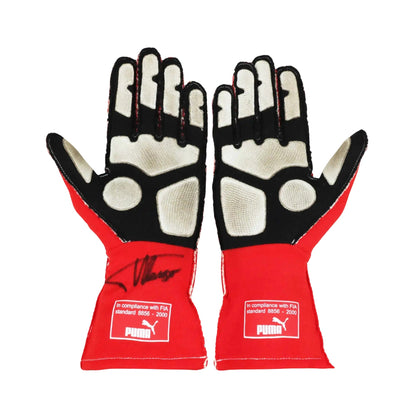 Pair of red and black Fernando Alonso 2014 F1 Racing gloves with Puma branding on a white background