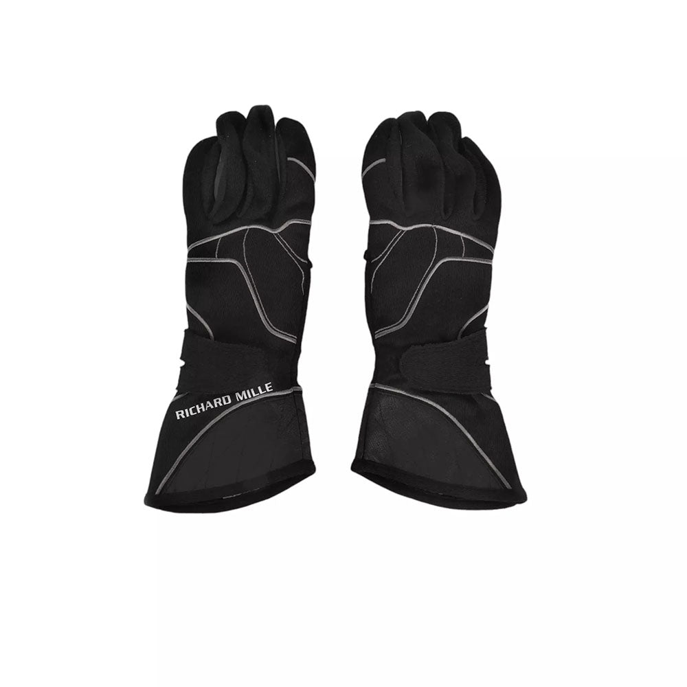 Black Fernando Alonso 2015 F1 racing gloves with 'Richard Mille' branding on a white background