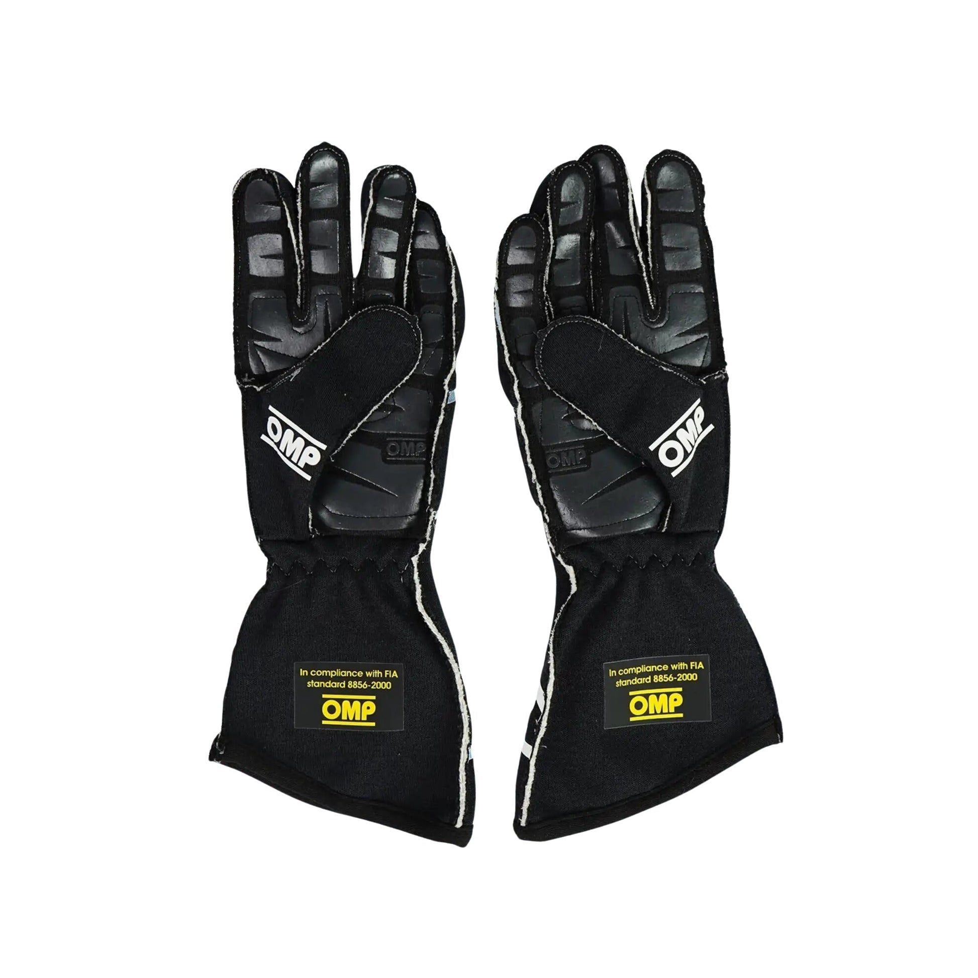 Pair of black Will Power 2011 IndyCar Racing gloves with OMP branding on a white background
