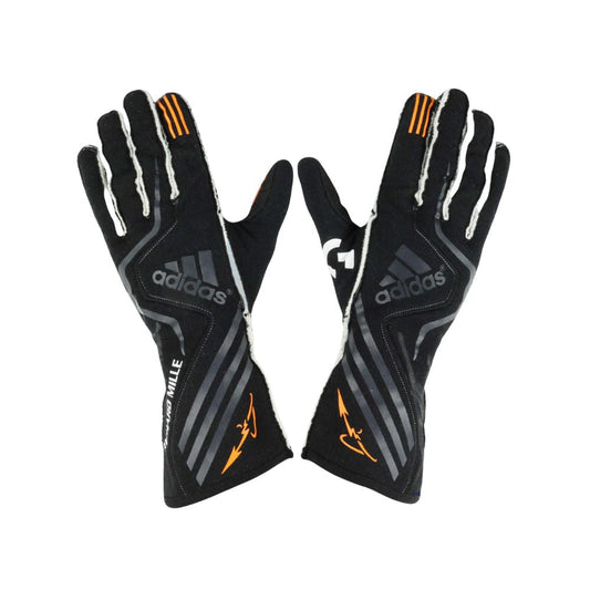 Pair of black Adidas Fernando Alonso 2017 F1 Racing gloves with orange accents on a white background