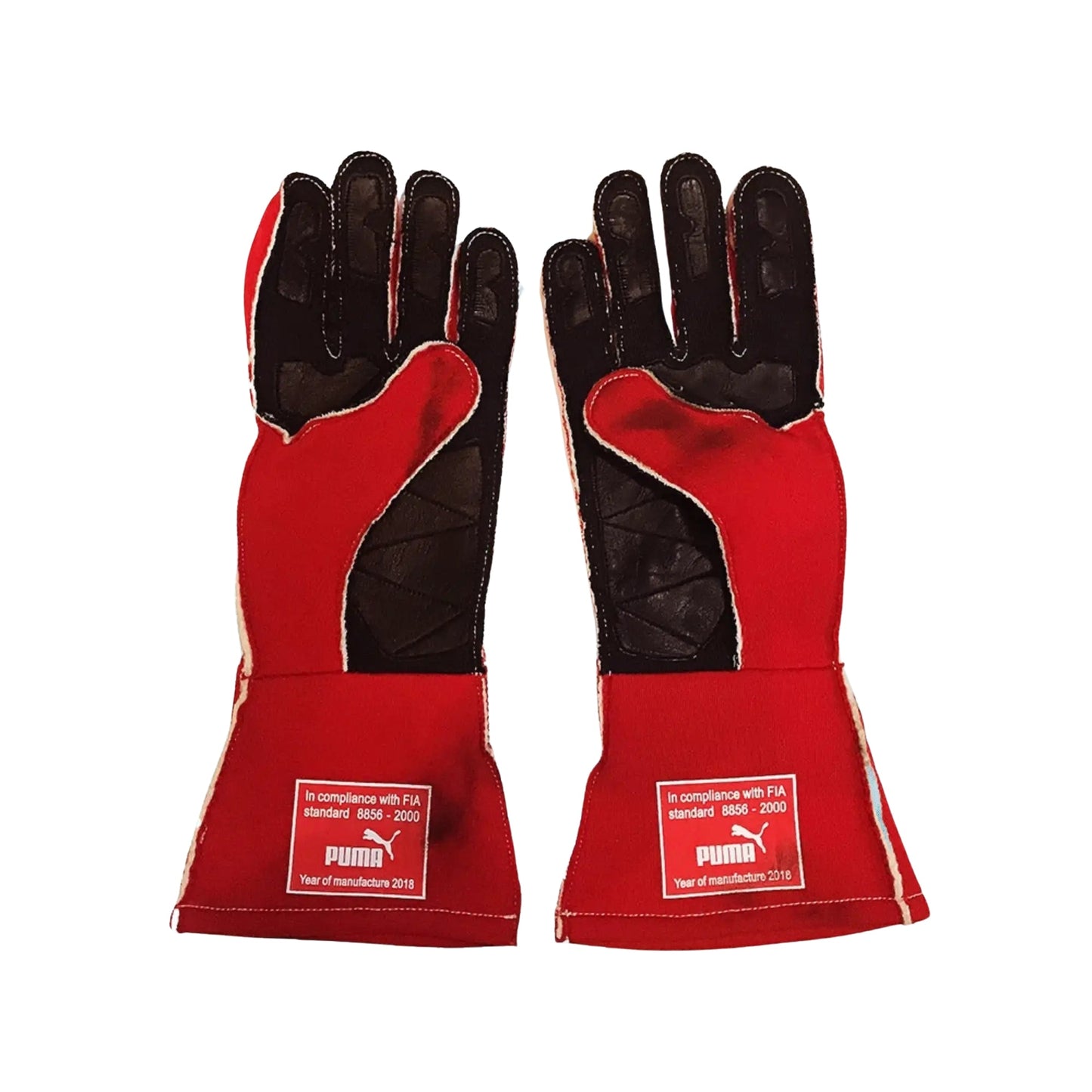 Red and black Kimi Raikkonen 2018 F1 racing gloves with Puma branding on a white background