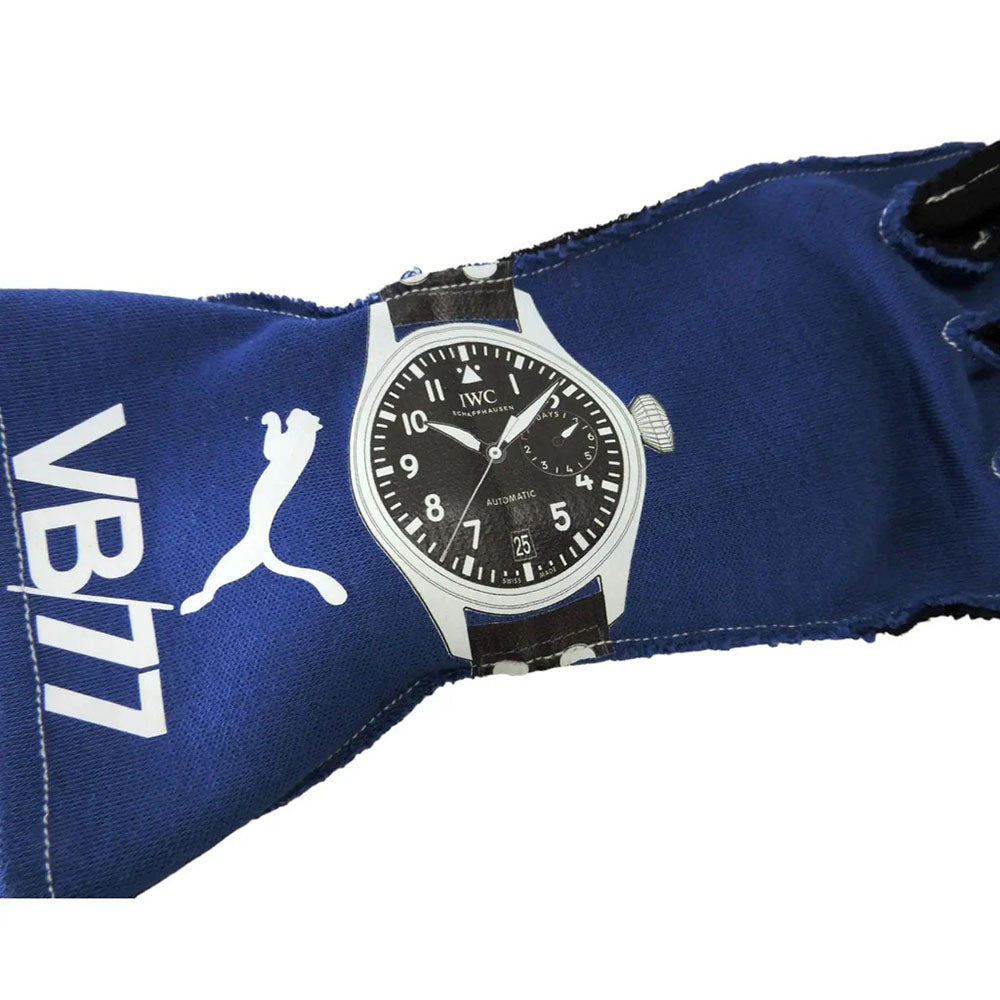Valtteri Bottas 2018 F1 racing gloves Wristwatch with black dial and silver case on a blue fabric background with 'VB17' branding.