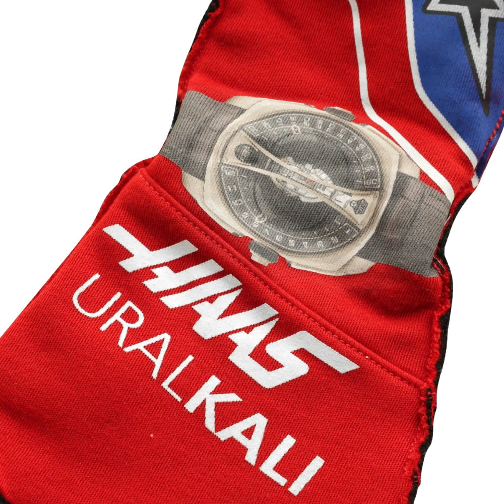 Red Nikita Mazepin 2021 Mexico GP F1 racing fabric with 'Uralkali' branding and a logo on a white background