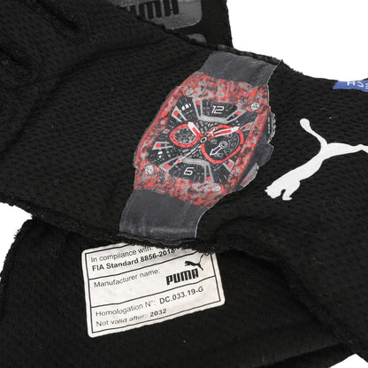 Black Valtteri Bottas 2022 British GP F1 Racing glove with a red and black watch design and Puma branding.