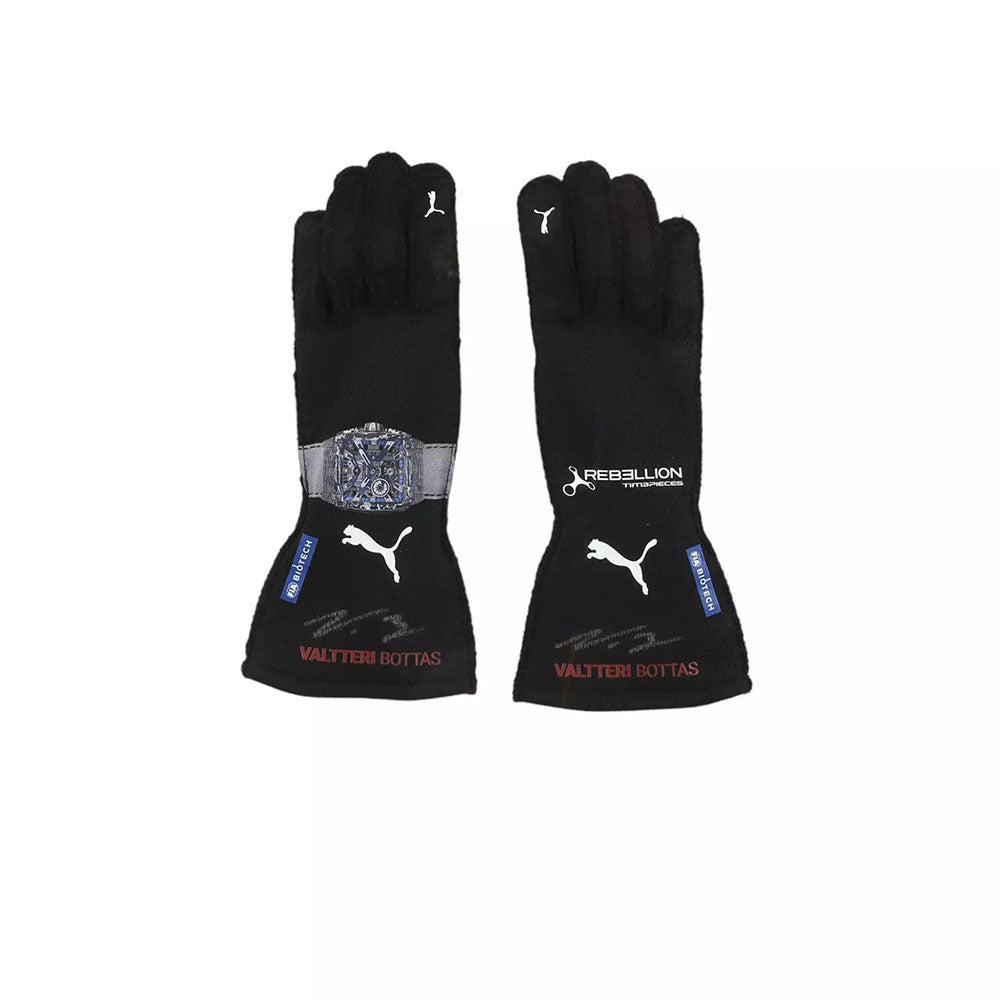 Pair of black Valtteri Bottas 2023 F1 racing gloves with branding on a white background