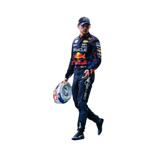 Side profile of Max Verstappen in the 2024 F1 racing suit, holding a helmet and standing in front of a white background.