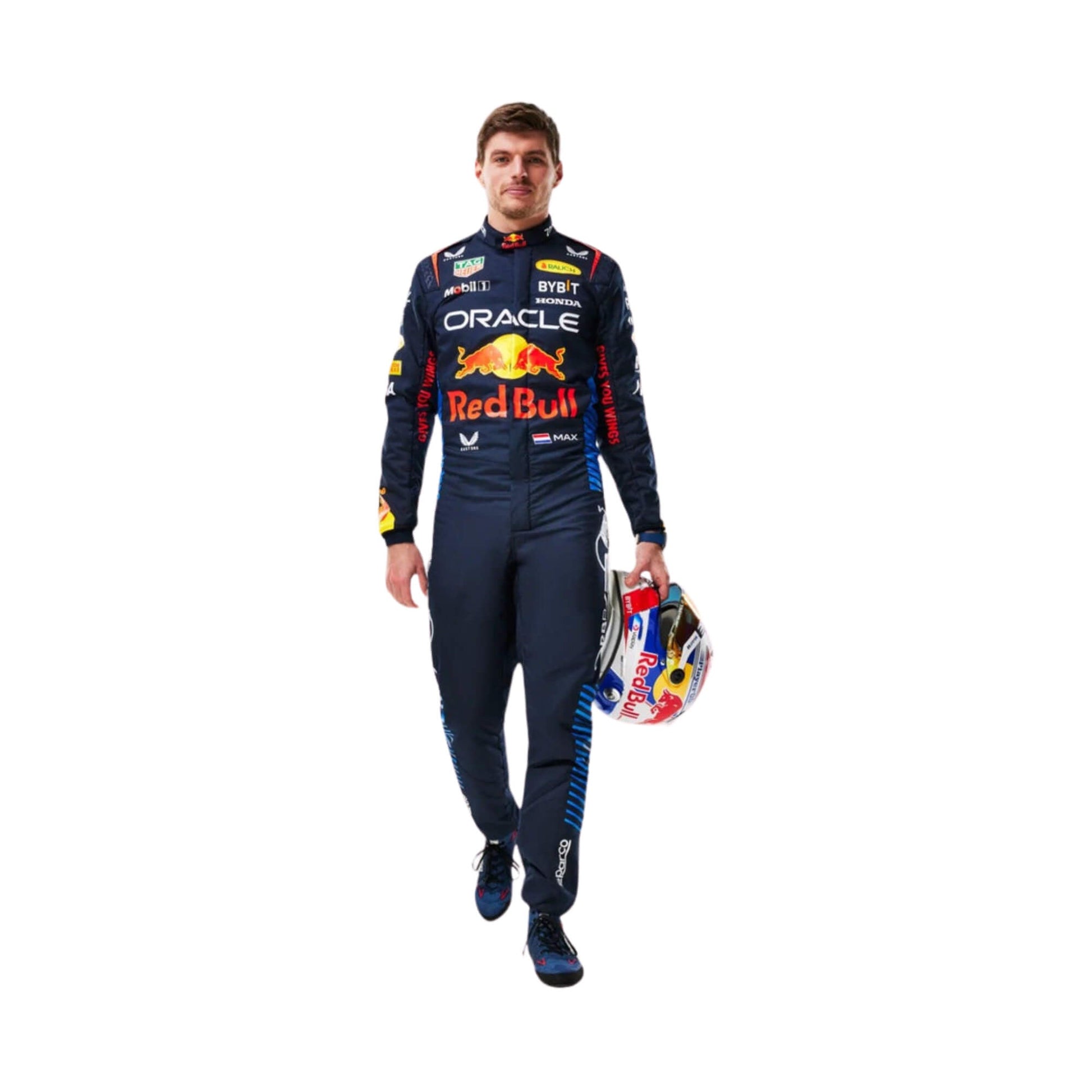 Max Verstappen in the 2024 F1 racing suit, holding a helmet and standing in front of a white background.