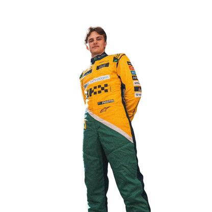 Detailed close-up showcasing fabric weave, stitching, and precise sponsor logo application on Oscar Piastri’s 2024 Monaco GP suit in papaya and anthracite tones.