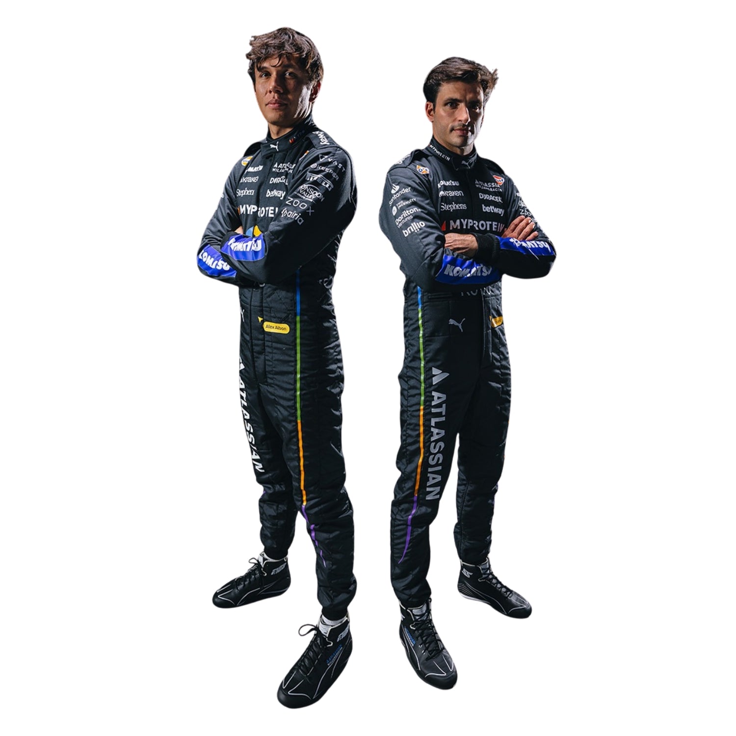 Two individuals wearing black racing suits with various logos on a white background