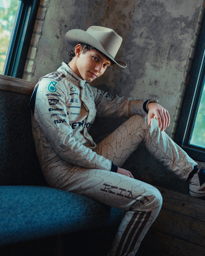 Side profile of Kimi Andrea Antonelli 2025 Austin GP F1 racing suit showing is inspired by the Mojave Desert.