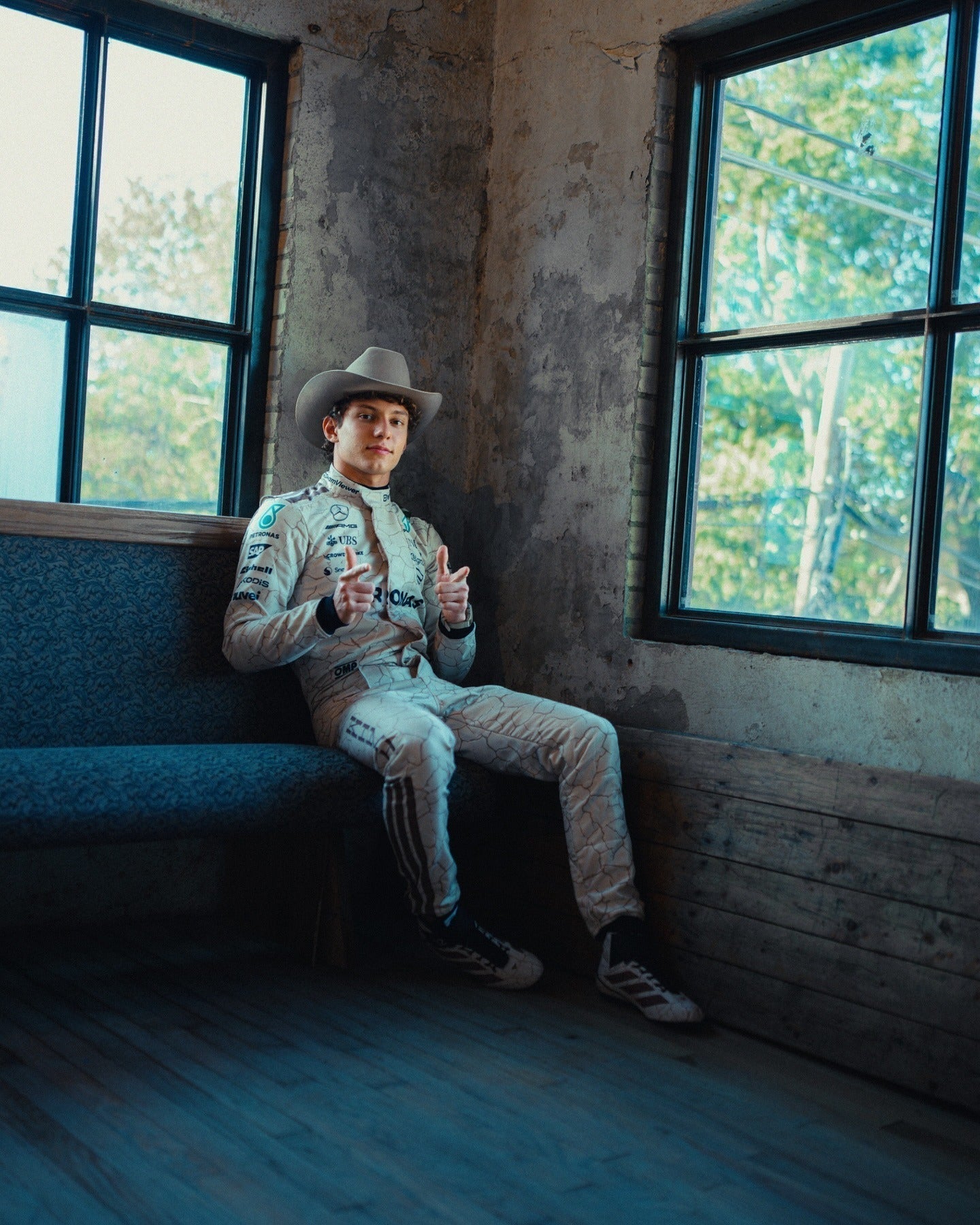 Side profile of Kimi Andrea Antonelli 2025 Austin GP F1 racing suit showing inspired by the Mojave Desert.