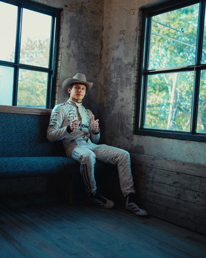 Side profile of Kimi Andrea Antonelli 2025 Austin GP F1 racing suit showing inspired by the Mojave Desert.