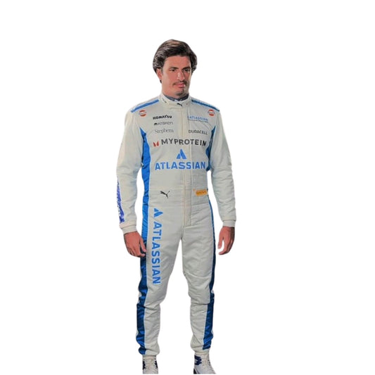 Front view of Carlos Sainz's 2025 F1 racing suit in white with blue side panels, featuring sponsor logos and a sleek design.