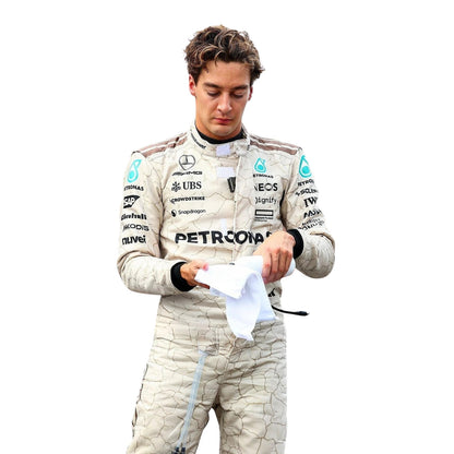 Close-up of stitching, blue accents, and detailing on George Russell 2025 USA Austin GP racing suit is inspired by the Mojave Desert