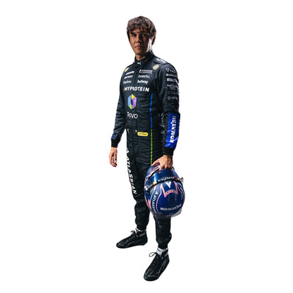 Alexender wearing 2025 las vegas a racing suit holding a helmet on a white background