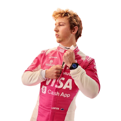 Liam Lawson wearing a pink F1 racing suit with various sponsor logos on a white background