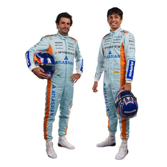 Two Formula 1 drivers in matching light blue racing suits with orange accents on a white background.