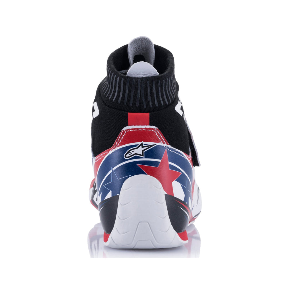 High-top Alpinestars Supermono v2 Grand Prix Racing sneaker with a star design on a white background