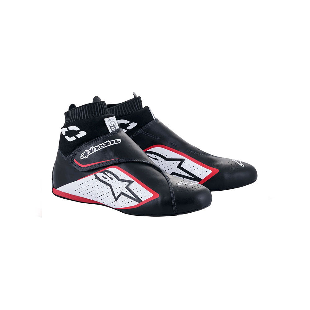 Black and white Alpinestars Supermono v2 racing shoes with red accents on a white background