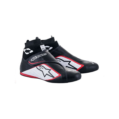 Black and white Alpinestars Supermono v2 racing shoes with red accents on a white background