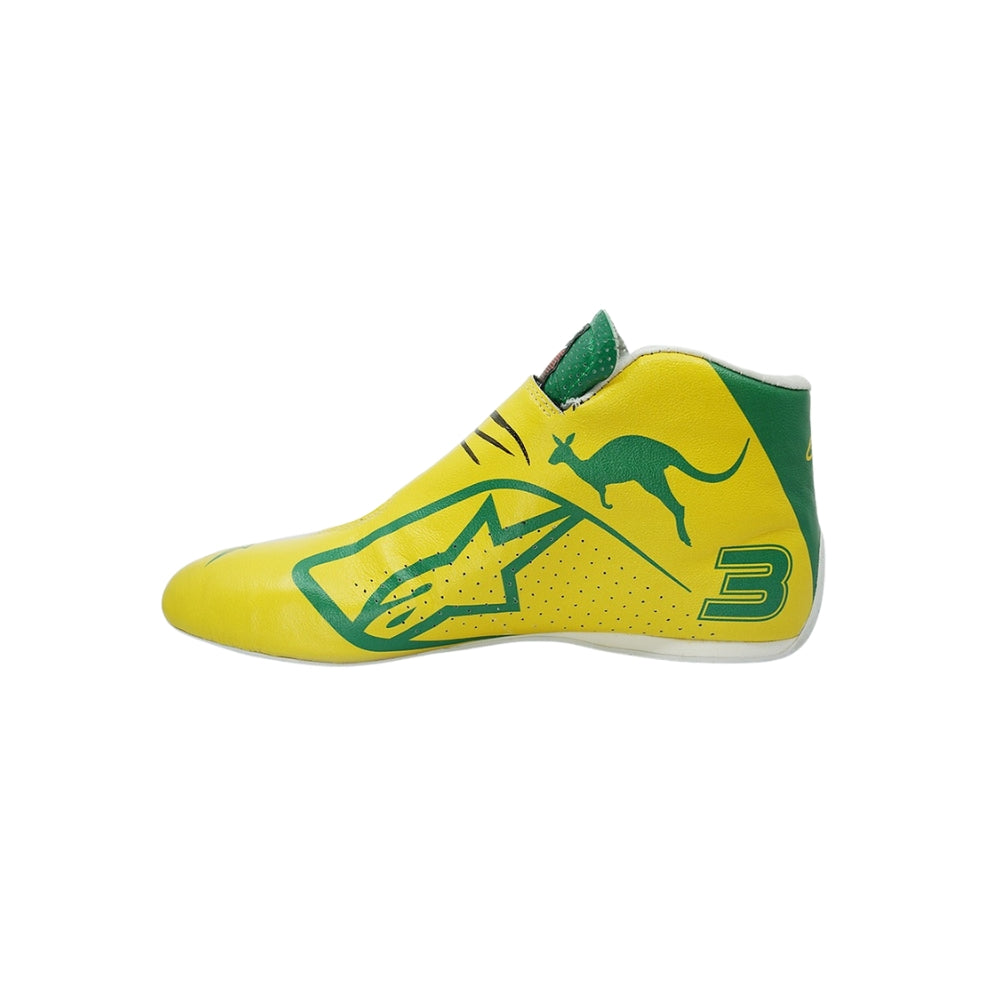 Yellow and green Daniel Ricciardo 2019 Australian Grand Prix F1 racing shoe with a logo and number on a white background