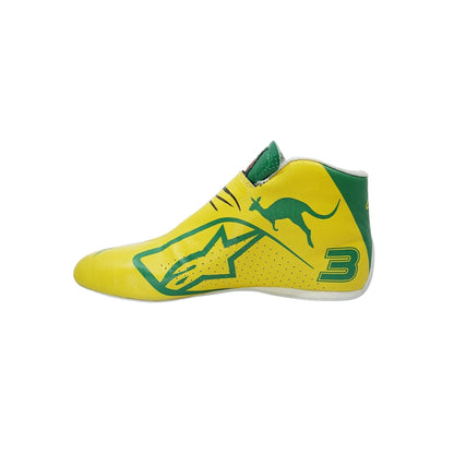 Yellow and green Daniel Ricciardo 2019 Australian Grand Prix F1 racing shoe with a logo and number on a white background