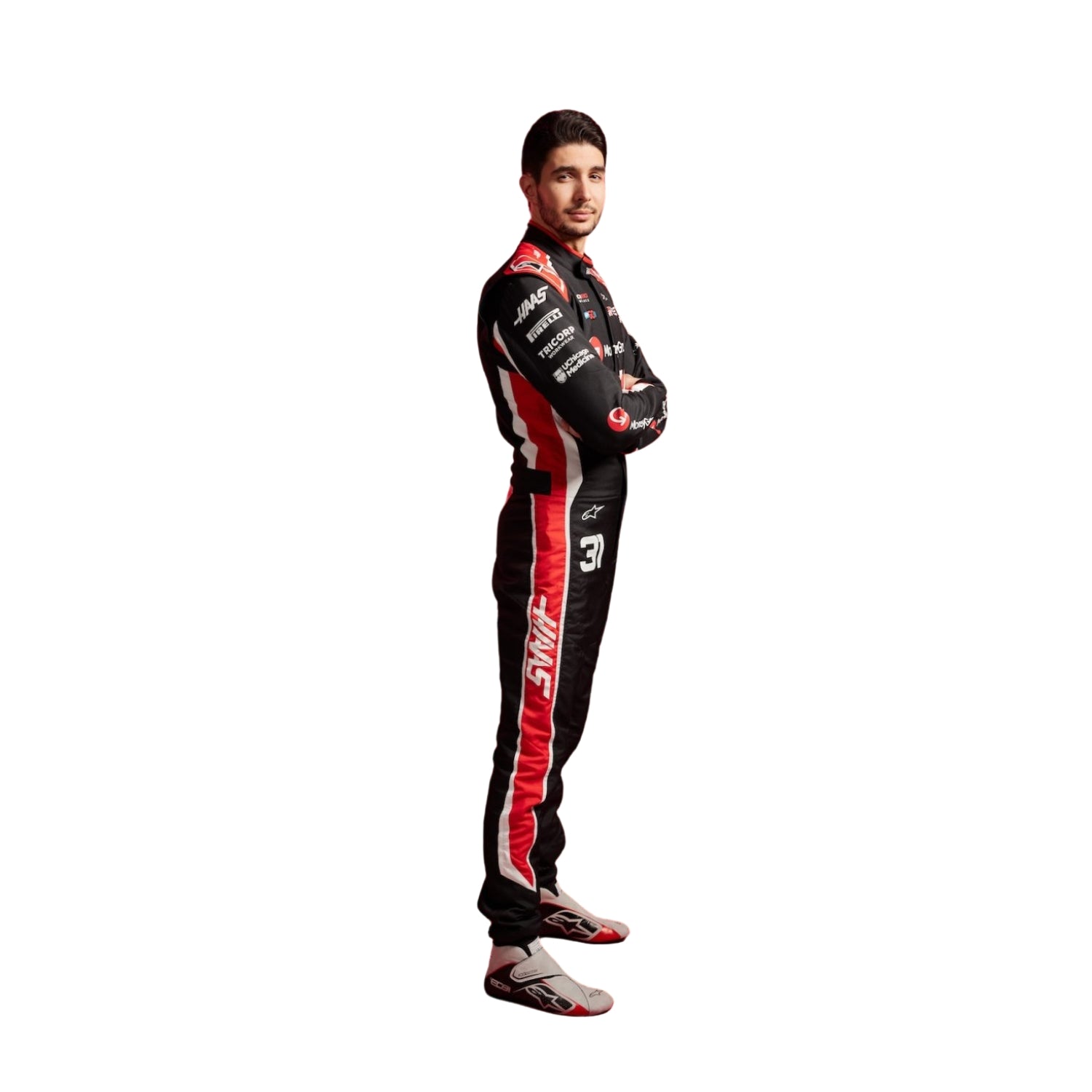 Right Side profile of Esteban Ocon wearing his 2025 racing suit, highlighting the suit's aerodynamic fit and detailing.
