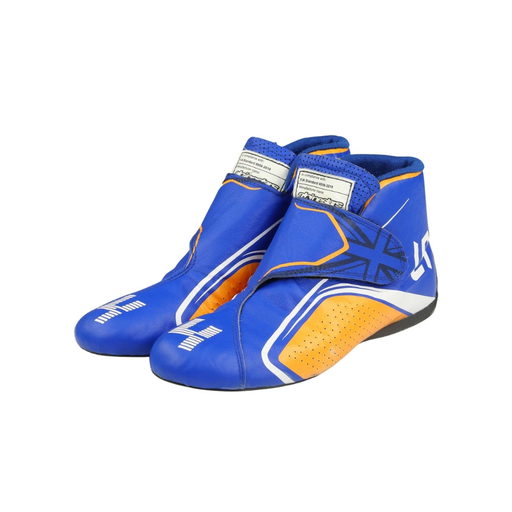 Blue and orange Lando Norris 2021 F1 Racing shoes on a white background