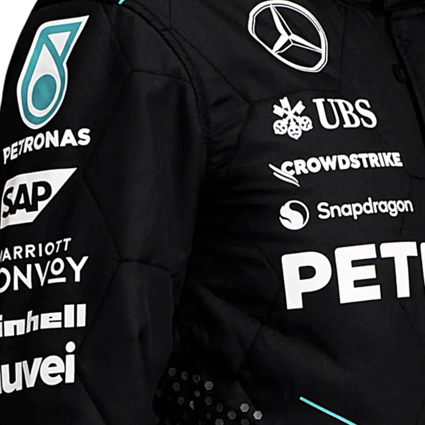 Black lewis hamilton 2024 mercedes f1 racing suit with various brand logos on a dark background