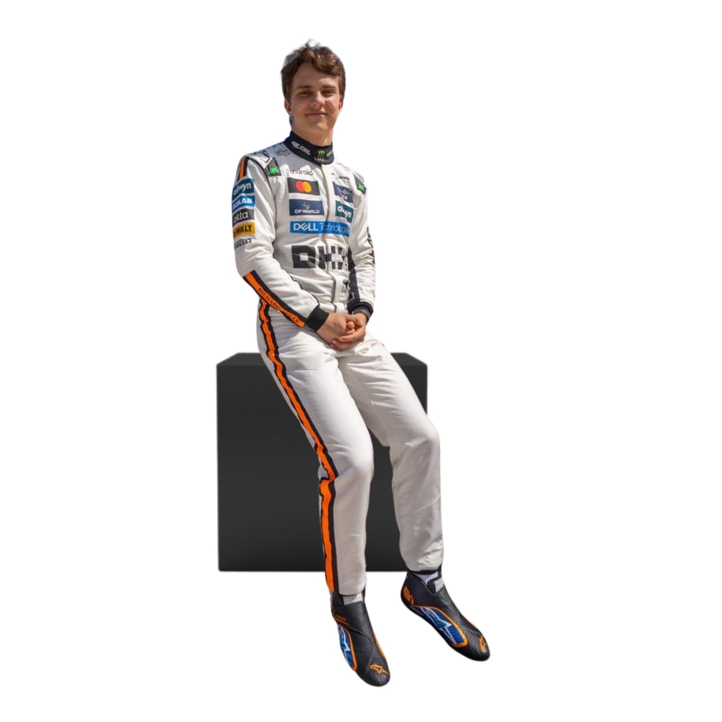 Front sitting view of the 2025 Monaco GP white race suit worn by Oscar Piastri featuring classic black number in circle on a retro-inspired all-white base.
