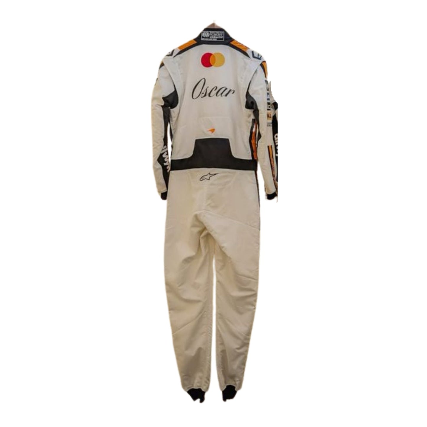 Oscar Piastri Mclaren 2025 Monaco Gp F1 racing suit with black and orange accents on a white background