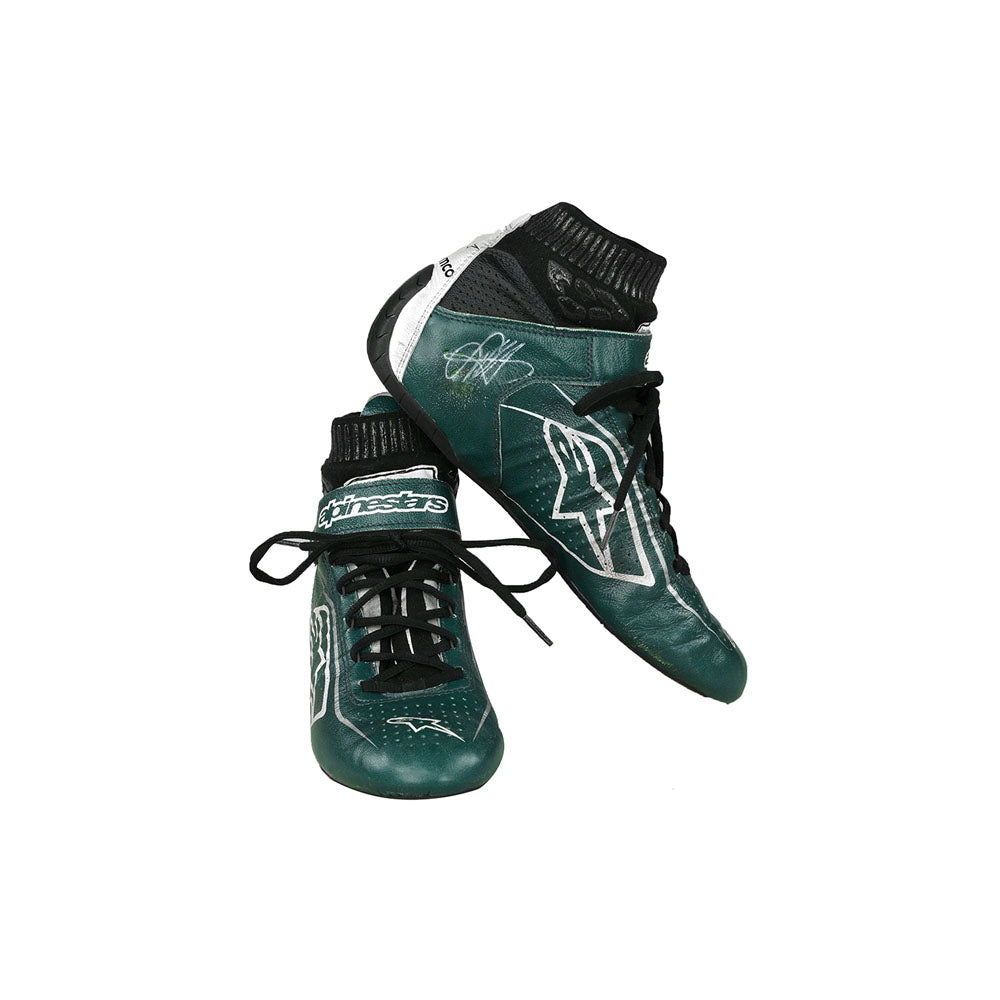 Green Sebastian Vettel 2022 F1 Racing boots with white accents on a white background