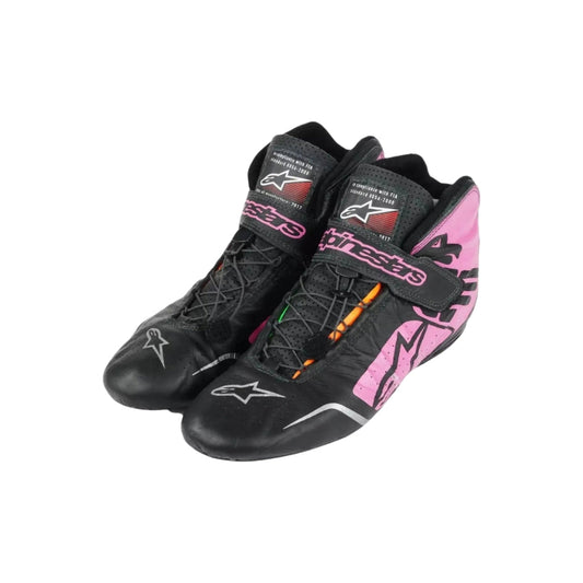 Black and pink Sergio Perez 2017 F1 Racing shoes with brand logo on a white background