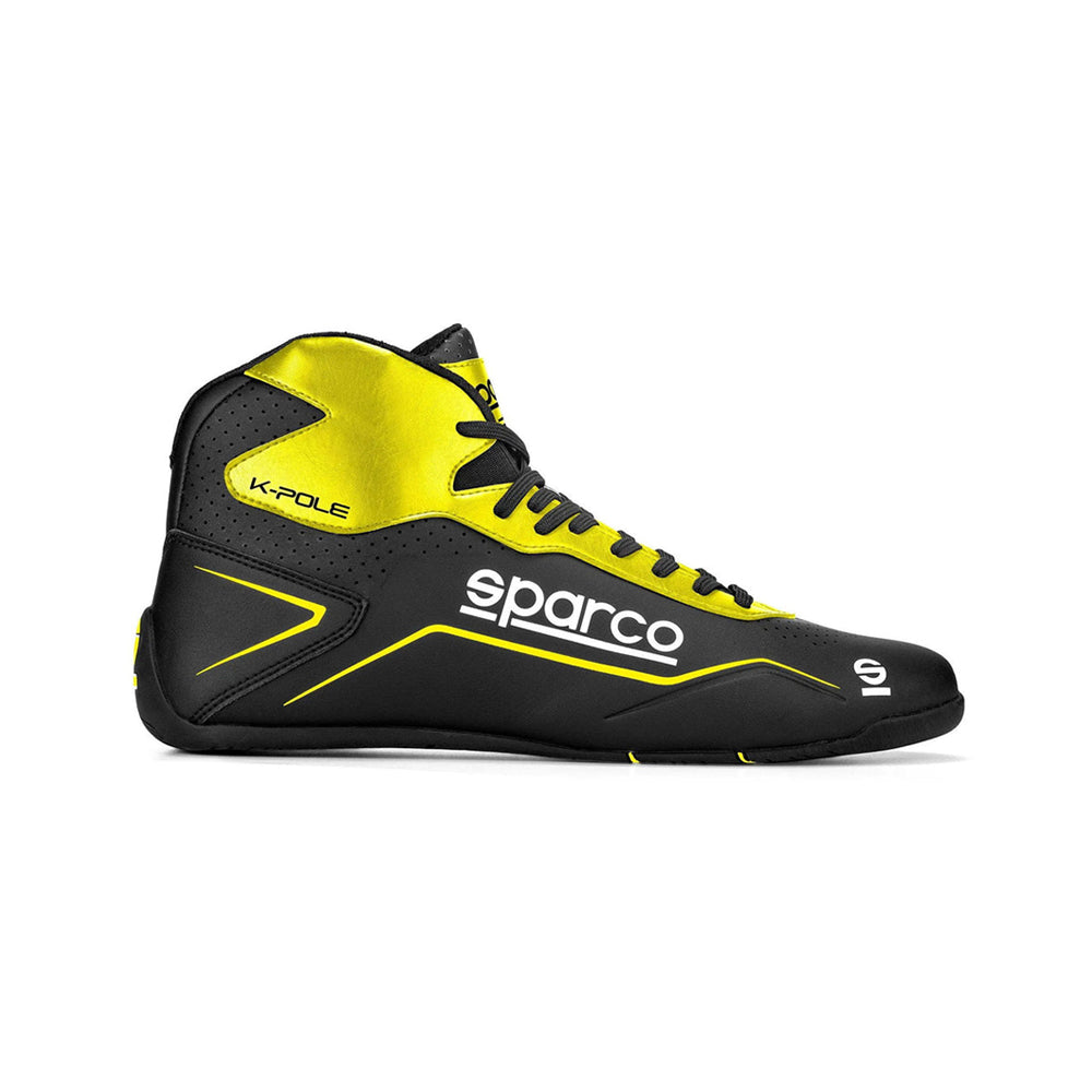 Black and yellow Sparco K-Pole Kart racing shoe with 'Sparco' branding on a white background