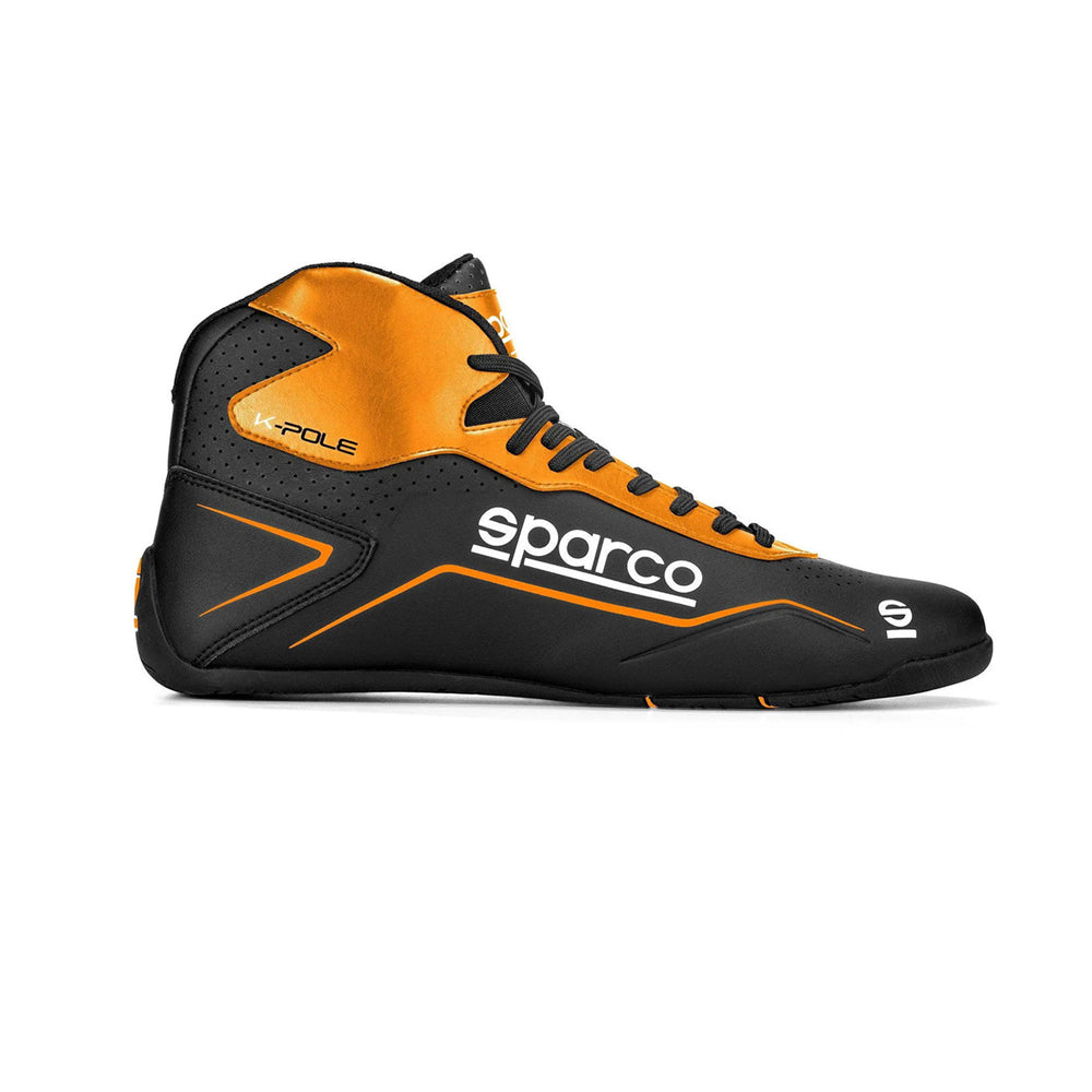 Black and orange Sparco K-Pole Kart racing shoe with 'Sparco' branding on a white background