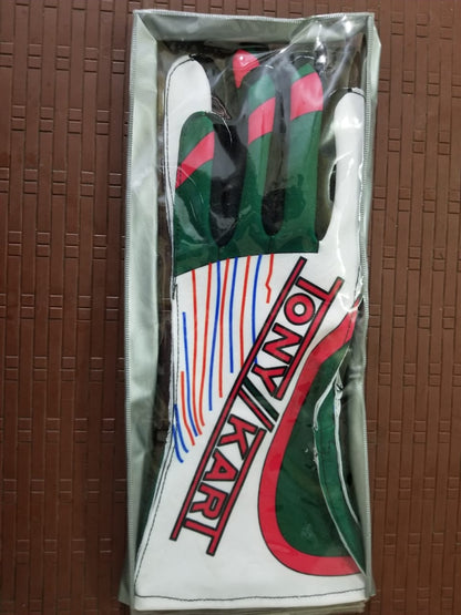 Pair of Tony Kart Pro Grip green and white gloves with red text in a clear package on a brown textured background